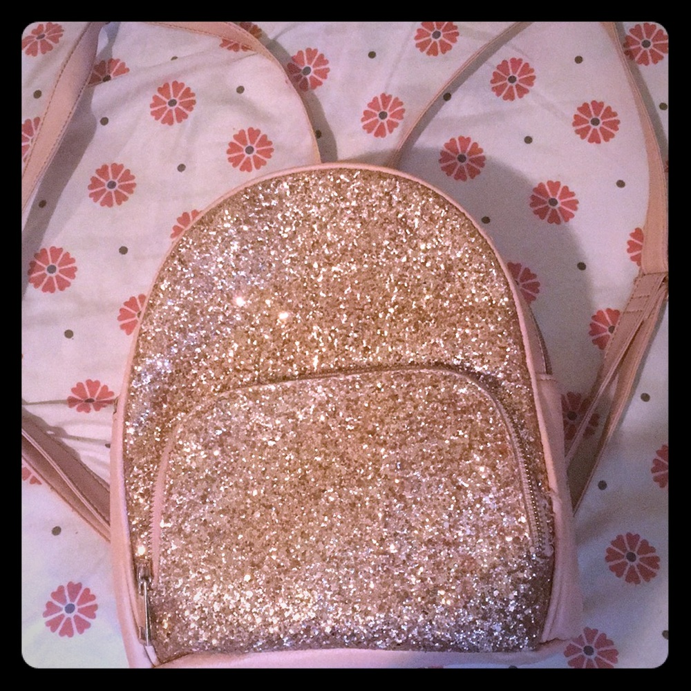 Mini rose gold book bag